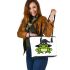 Cartoon green frog wearing black witch hat leaather tote bag