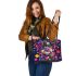 Colorful cute cartoon dog with bow leather tote bag