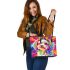 Colorful cute happy dog with bow leather tote bag