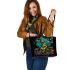 Colorful green frog playing banjo under mushroom leaather tote bag