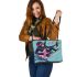 Cool monkey surfing with electric guitar leather tote bag