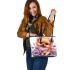 Cute adorable pomeranian puppy with fluffy fur leather tote bag