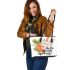 Cute bunny sitting on top of an carrot hello spring leather tote bag