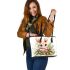 Cute cartoon baby bunny with big eyes sitting leather tote bag