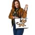 Cute cartoon dog clip art with a simple drawing leather tote bag