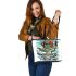 Cute cartoon frog eating ramen shown in a full body shot leaather tote bag