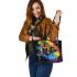 Cute cartoon frog with rainbow colored skin leaather tote bag