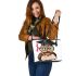 Cute cartoon owl with glasses and graduation hat holding book leather tote bag