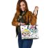 Cute cartoon owls with colorful hats and headphones leather tote bag