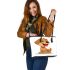 Cute cartoon puppy with red collar sitting leather tote bag