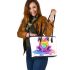 Cute cartoon rainbow frog sitting on a water puddle leaather tote bag
