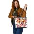 Cute corgi puppy with pink roses in her hair and butterflies leather tote bag