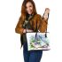 Cute dragonfly perched on an open book leather tote bag
