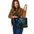 Cute owl cartoon with big blue eyes night scene with moon leather tote bag