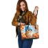 Cute owl in blue hat sitting on the log surrounded leather tote bag
