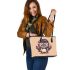 Cute owl teacher with glasses and a book in his hand leather tote bag