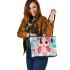 Cute pink owl with a bow on its head leather tote bag