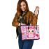 Cute pink owl with a bow on its head surrounded by candy leather tote bag