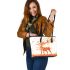 Deer with antlers made of autumn leaves stands leather totee bag