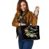 Dragonflies and three flowers on the moon leather tote bag