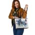 Dragonfly with swirling lines and swirls leather tote bag