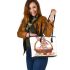 Easter bunny with a basket full of easter eggs leather tote bag