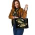 Flowers and dragonflies around the moon leather tote bag