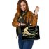 Green dragonflies flying around the moon leather tote bag