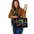 Green frog doing the peace sign in vibrant colors leaather tote bag