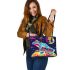 Illustration of a psychedelic frog on the moon leaather tote bag