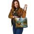 Majestic deer with impressive antlers stands gracefully leather totee bag