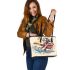 Monkey surfing with electric guitar and headphones leather tote bag