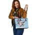 Monkey wearing sunglasses skiing with electric guitar leather tote bag