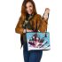 Monkey wearing sunglasses skiing with electric guitar leather tote bag