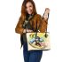 Monkey wearing sunglasses surfing with banana leather tote bag