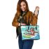 Monkey wearing sunglasses surfing with coconuts leather tote bag
