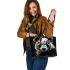 Panda with black and white fur and colorful floral leather tote bag