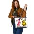 Pinky pigs and yellow grinchy smile toothless like leather tote bag