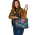 Psychedelic frog sits on the edge of an enchanted pond in the forest leaather tote bag