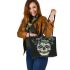 Skull with green frog on top leaather tote bag
