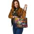 Vibrant painting of an happy dancing frog leaather tote bag