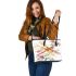 Watercolor dragonfly among flowers leather tote bag