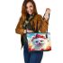 White pomeranian puppy with blue eyes leather tote bag