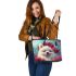 White pomeranian puppy with blue eyes leather tote bag