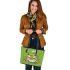 An adorable green frog eating ramen noodles leaather tote bag
