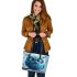 Cartoon blue owl with big eyes leather tote bag