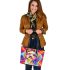 Colorful cute happy dog with bow leather tote bag