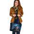 Cute owl cartoon with big blue eyes night scene with moon leather tote bag