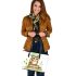 Cute owl wearing a green beret sitting on books leather tote bag