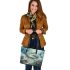 Wilds flying animals with dream catcher leather tote bag